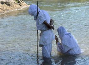 Image result for photos of mandeans in river