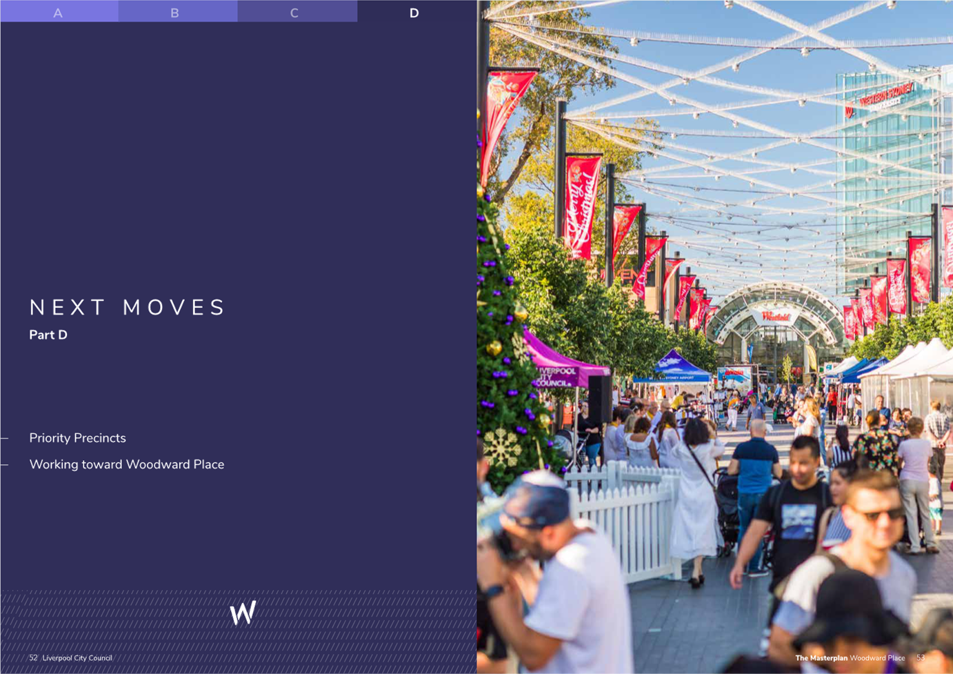 A group of people walking on a street

Description automatically generated