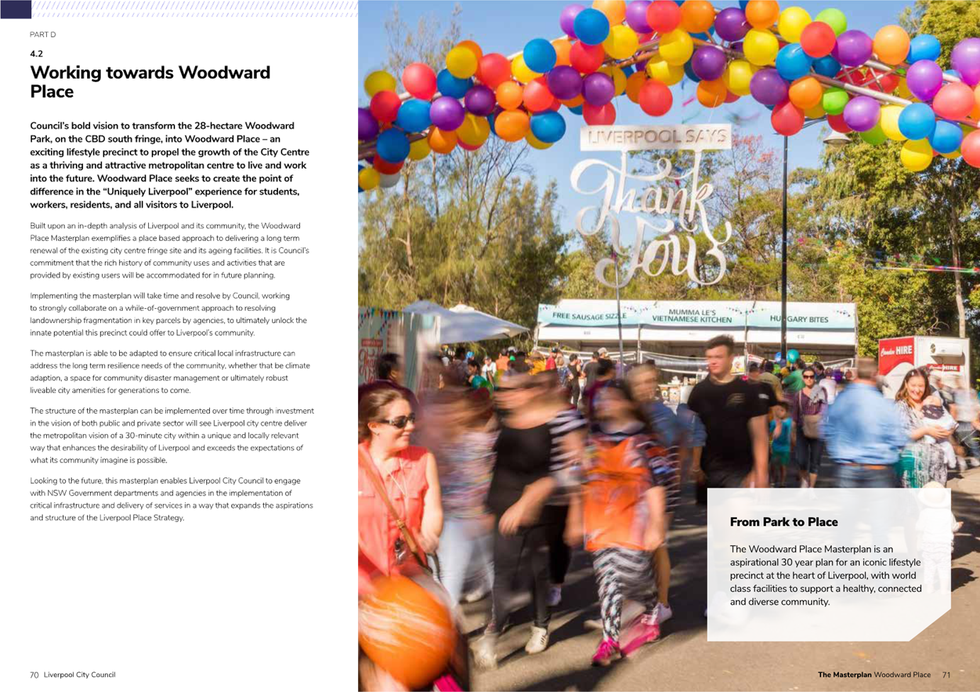 A group of people under a balloon arch

Description automatically generated
