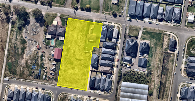 An aerial view of a neighborhood

Description automatically generated