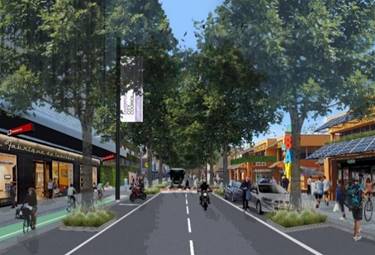 A street with trees and people on it

Description automatically generated