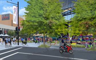 A street with people walking and a motorcycle

Description automatically generated with medium confidence