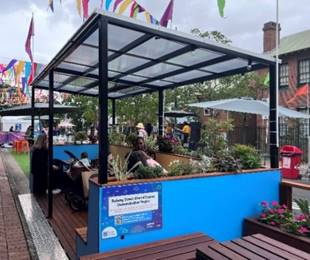 A blue patio with a glass roof

Description automatically generated with medium confidence