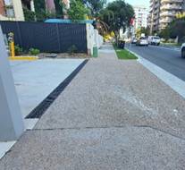 A road with cars on it

Description automatically generated