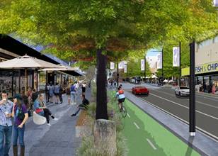 A street with people walking on it

Description automatically generated