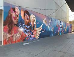 A wall with a mural on it

Description automatically generated with medium confidence