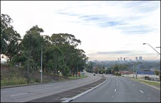 A road with trees on the side

Description automatically generated