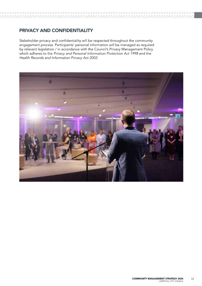 A person speaking into a microphone

Description automatically generated